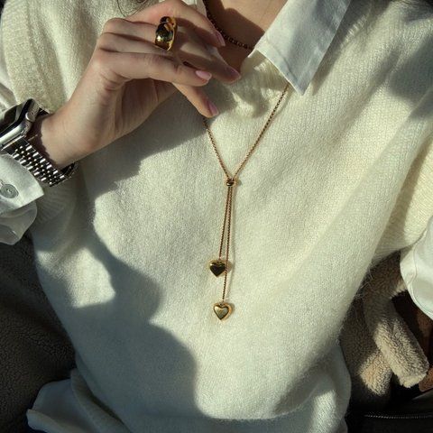 Tie necklace with hearts in gold color