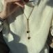 Tie necklace with hearts in gold color