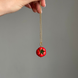 TOMATO pendant on a chain with gold-tone hardware