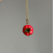 TOMATO pendant on a chain with gold-tone hardware