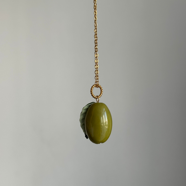 Olive-shaped bead on a chain with gold-tone hardware