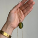 Olive-shaped bead on a chain with gold-tone hardware