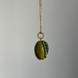 Olive-shaped bead on a chain with gold-tone hardware
