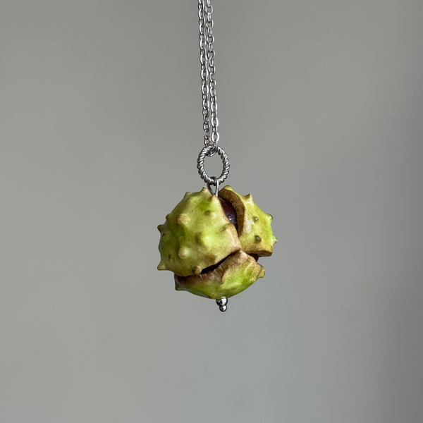 KASHTAN on a chain with silver hardware